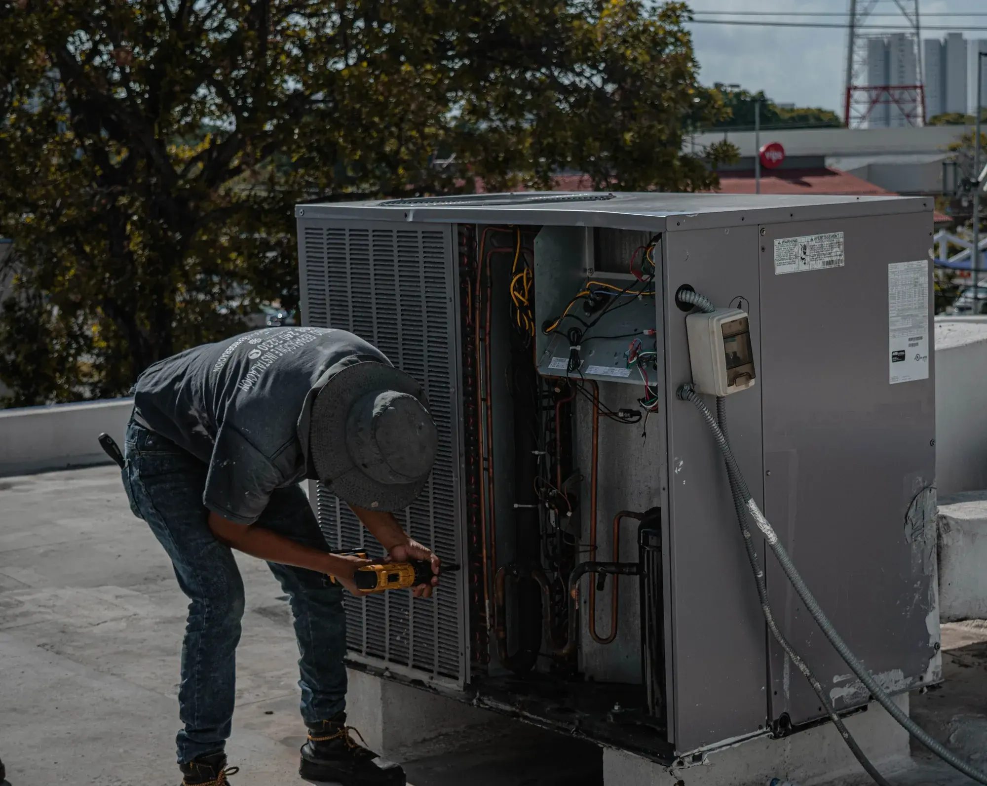 North Macomb Heating & Cooling technician at work